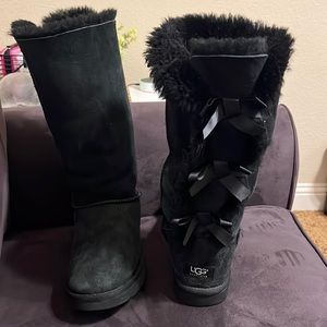 Black three now UGG boots.